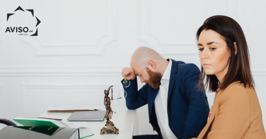 couple talking to a lawyer